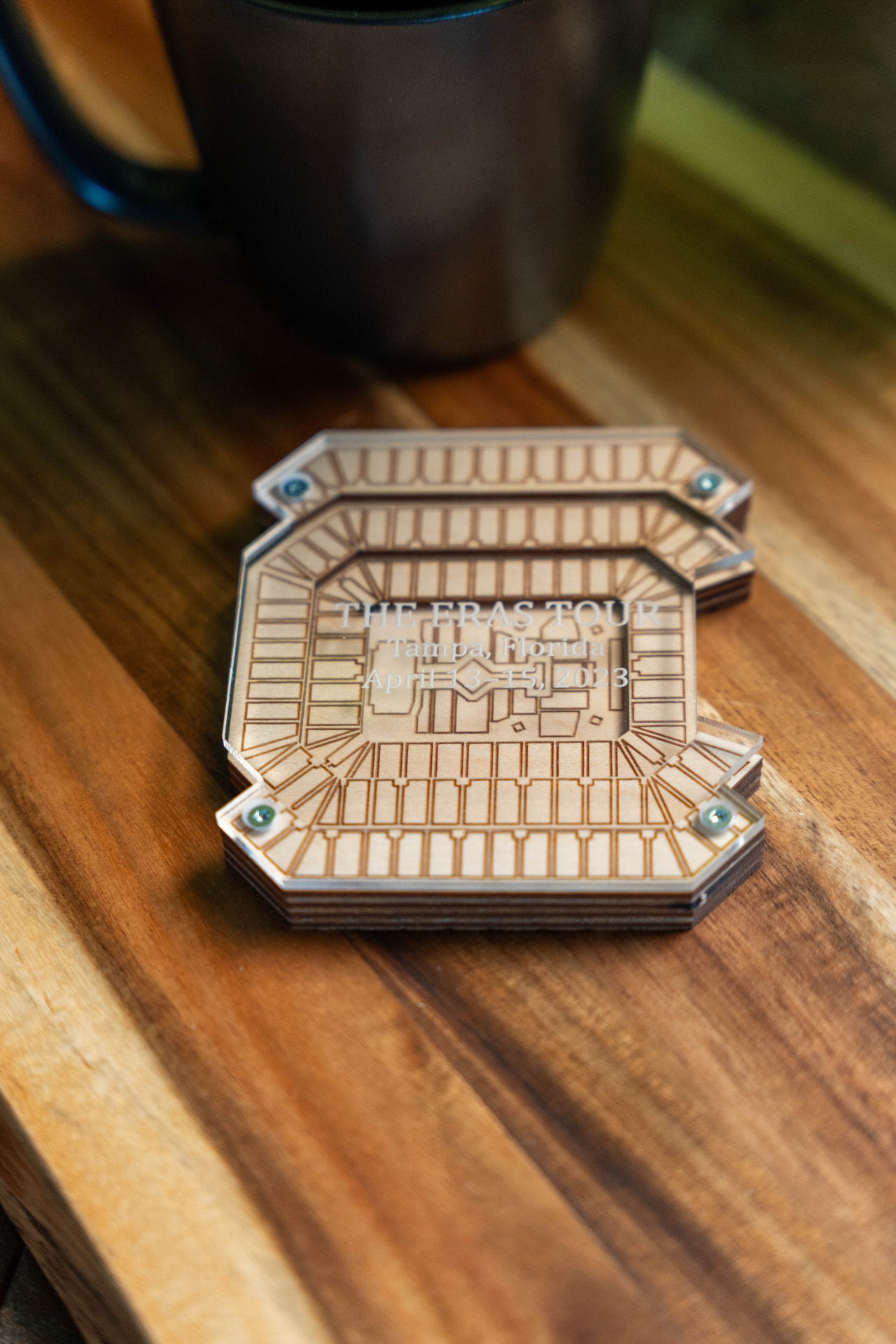 Layered 3D Eras Tour Tampa keepsake on a cutting board